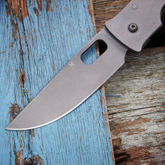 Tom Mayo M logo Folder